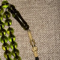 سبحة زعفرانية مع طربزونتين فضة عيار 1000