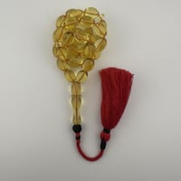 سبحة كهرمان كاريبي طبيعي شفاف