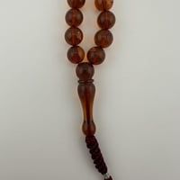 سبحة كهرمان كاريبي طبيعي شفاف