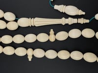 عاج ناب الفيل بشاهد منقوش قصة بيضاوي