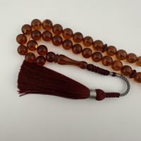 سبحة كهرمان كاريبي طبيعي شفاف