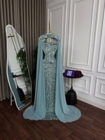 فستان سهرة باكمام طويل أنيقه