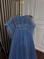 فستان سهرة مطرز باللؤلؤ