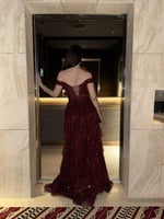 فستان سهرة لؤلؤ كلاسيكي يوحى بالفخامه