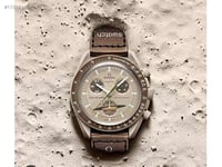 ساعة اوميغا سواتش بني غامق - سواتش