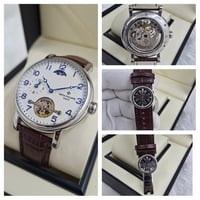 ساعه باتك فليب جلد بني مع فضي مينا ابيض