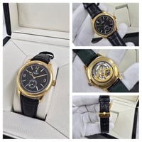 ساعة رولكس جلد اسود مع ذهبي مينا اسود