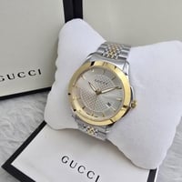 ساعة قوتشي الرجالية فضي مع ذهبي - لمسه ذوق