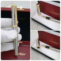 قلم كارتير سانتوس فضي مع ذهبي فص ازرق