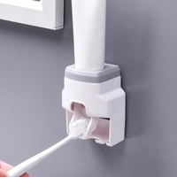 موزع فرش أسنان أوتوماتيكي. يُثبّت على الحائط، ويتي...