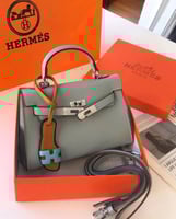 M. شنطة Hermès