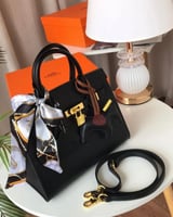 M. شنطة Hermès