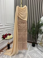 فستان سهره يتميز بتطريز راقي