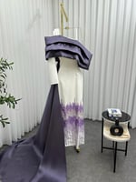 فستان ابيض بتطريز وذيل بنفسجي انيق