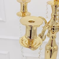 شمعدان ذهبي بقاعدة فاخر