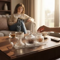 طقم ضيافة زجاج يحتوي على صينية فيها مبخرة وتمرية و...