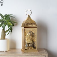 فانوس رمضاني ذهبي مضئ