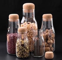 علبة زجاج بغطاء خشب