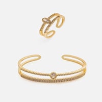 ‎ طقم نسائي فاخر بلون ذهبي