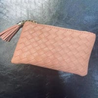 ‎ محفظة نسائية من الجلد بلون وردي