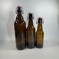 قارورة زجاجية عنبر اللون عالي الجودة و تتحمل ضغط ا...