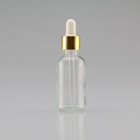 قارورة زجاج سيرم شفاف سعة 50 مل مع قطارة على المنض...