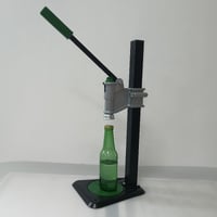 جهاز (الة) الإغلاق الاغطية التاجية لعلب الزجاج