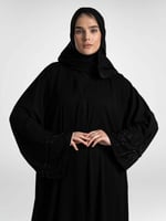 عباية بأكمام شك