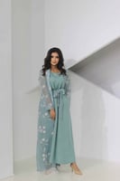 جلابية بلون تفاحي مطرزه بأبيض