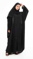 عباية بقصة واسعه واكمام مزمومه