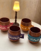 كوب خشبي بمسكة جلد