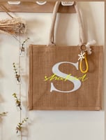 شنطة مقاس صغير الاسم + الحرف