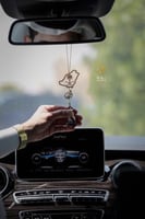 تعليقة سيارة اليوم الوطني بتولة العطر