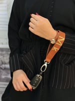 تعليقة مفاتيح جلد بكتابة بالاسم حسب اختيارك بتصميم...