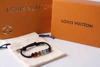 اسورة لويس فيتون(تركوازي غامق)