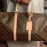 شنطة يدويةLV بنى