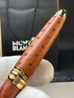 قلم خشبي مذهًب