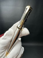 قلم سانتوس مذهًب