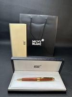 قلم خشبي مذهًب