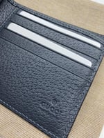 محفظة قوتشي رمادي