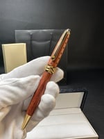 قلم خشبي مذهًب