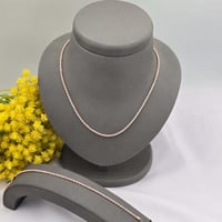 عقد + أسوارة