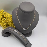 عقد + أسوارة