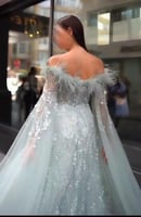 فستان لؤلؤ فيروزي