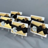 توزيعات تخرج مرايا شنطة 12 حبة