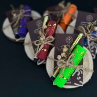 توزيعات يوم التاسيس بقاعدة خشبية