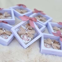 توزيعات العيد - توزيعات زينة شعر بإطار