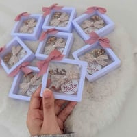 توزيعات العيد - توزيعات زينة شعر بإطار