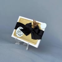 توزيعات تخرج مرايا شنطة 12 حبة