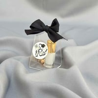 توزيعات التخرج مسك أبيض بشنطة اكريليك 12 حبة